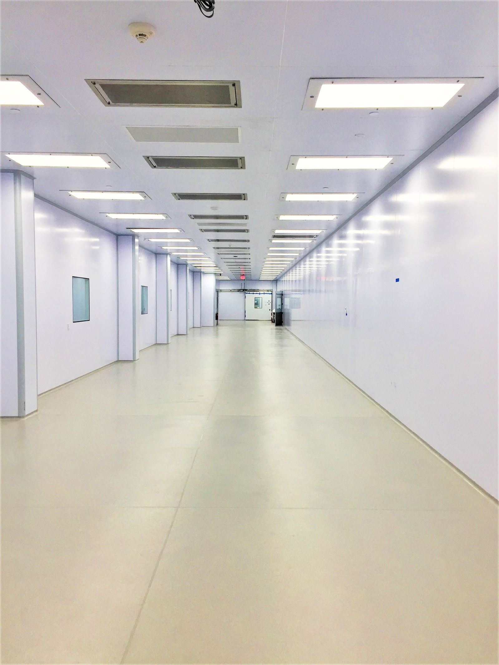 Cleanroom production corridor serving the classified suites